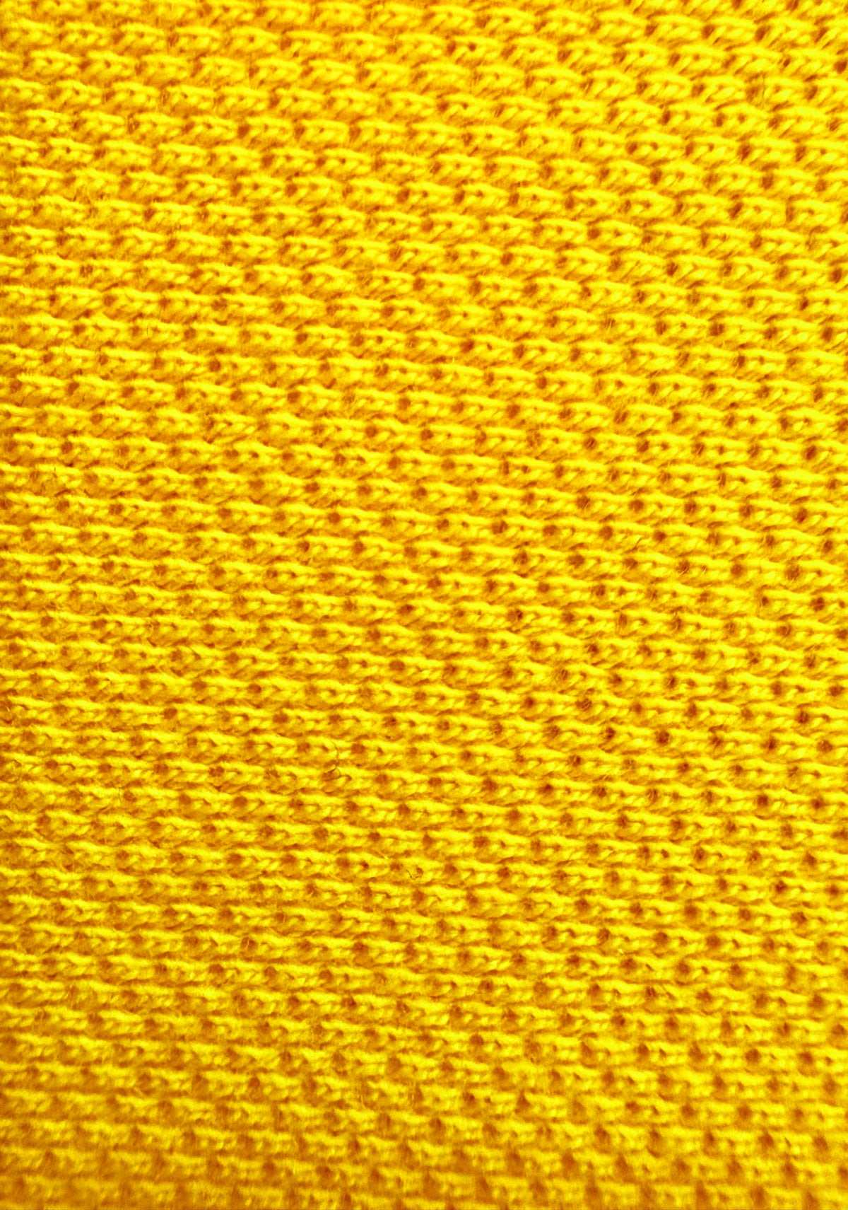 A heavier gold knit, the honeycomb standing off the cloth