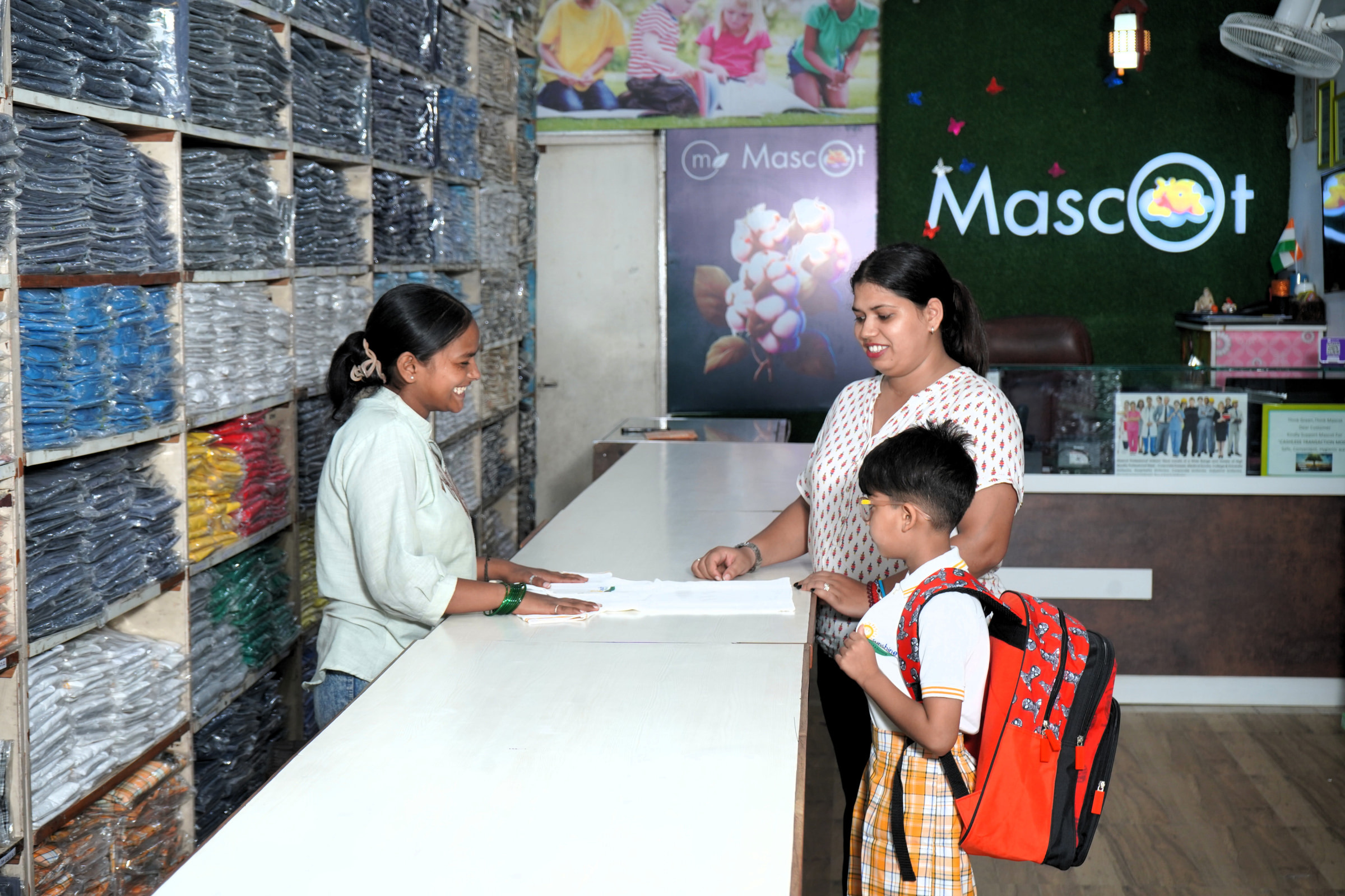 A parent and child at the Sector 35 counter