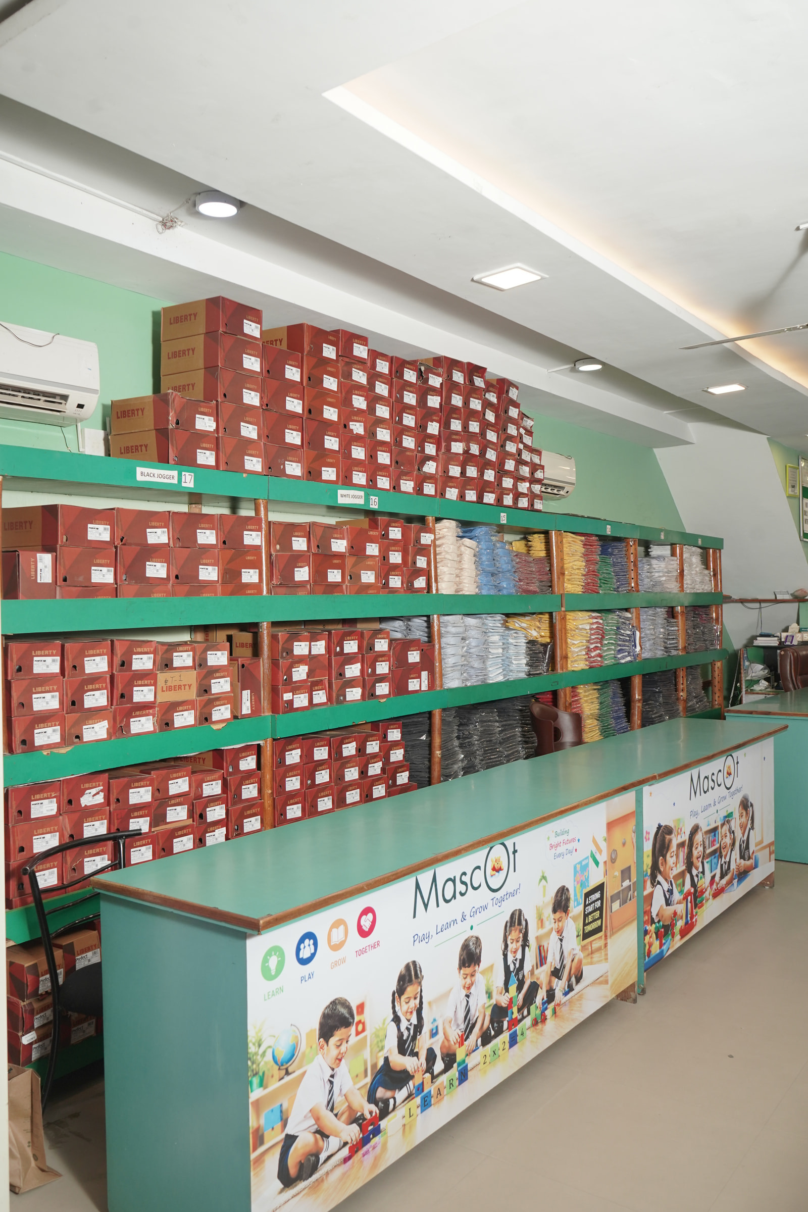 The billing counter at Mohali under the shoe shelving